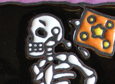 Marathon. Day-Of-The-Dead Clay Tile Close-Up
